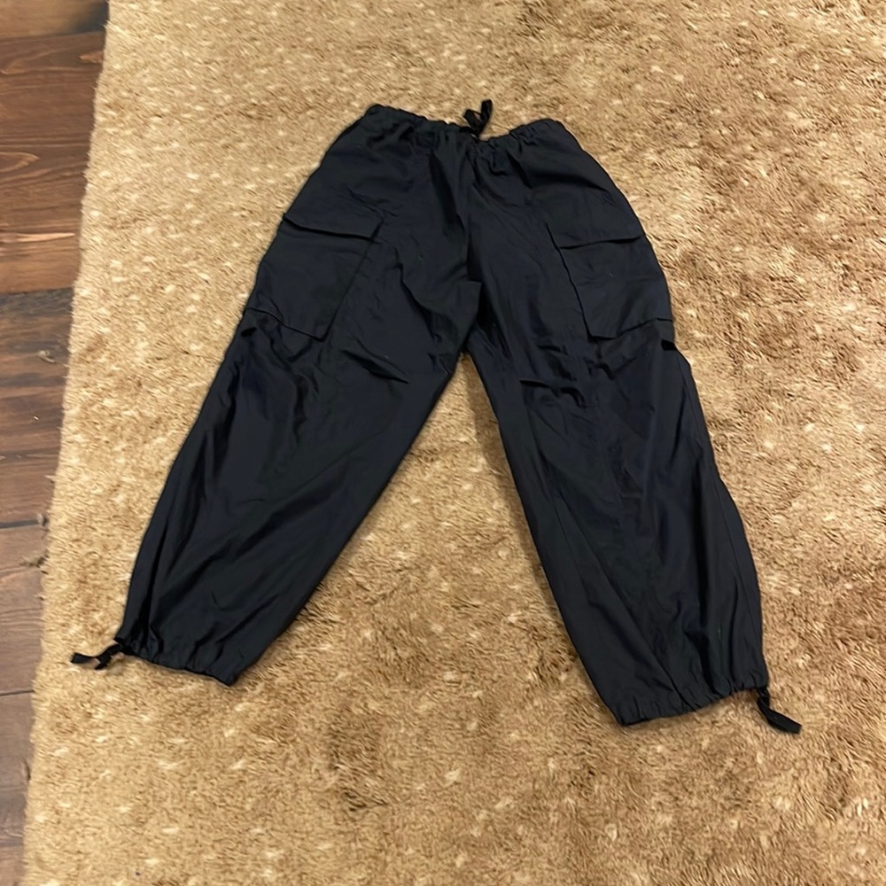 Black cargo parachute pants